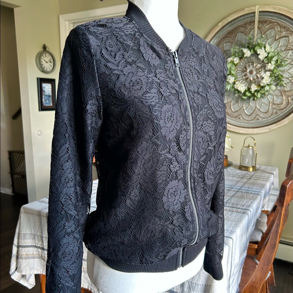 Stylish, black lace lined jacket